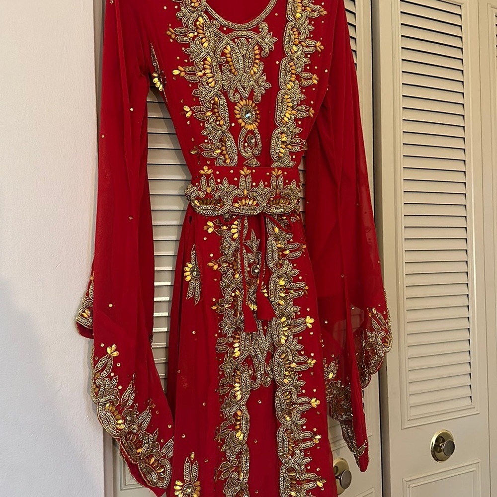 red and gold kaftan with matching scarf